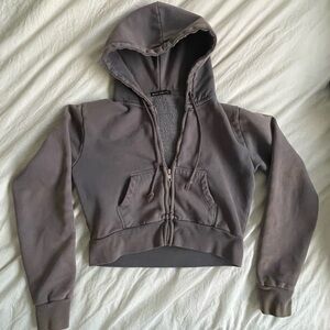 Cropped purple zip up hoodie from Brandy Melville